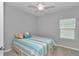 Cozy bedroom featuring a comfortable bed, soft lighting, and a relaxing atmosphere at 9262 Sw 58Th Cir, Ocala, FL 34476