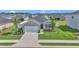 Charming single-story home with a well-manicured lawn, landscaped garden, and inviting curb appeal at 9262 Sw 58Th Cir, Ocala, FL 34476