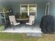 Comfortable outdoor patio area, perfect for enjoying outdoor meals and relaxation at 1185 Sabine Ln, Kissimmee, FL 34759