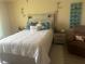 Comfortable bedroom featuring neutral walls, modern furniture, and ample natural light at 1185 Sabine Ln, Kissimmee, FL 34759