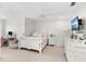 Bright, spacious bedroom with a white theme, featuring a full bed, dresser, desk and chair at 10160 Mallard Landings Way, Orlando, FL 32832