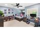 Spacious bedroom with blue walls, a full bed, desk, and shelves displaying collectibles at 10160 Mallard Landings Way, Orlando, FL 32832