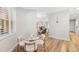Charming breakfast nook with a glass table, comfortable chairs, and a bright window view at 10160 Mallard Landings Way, Orlando, FL 32832