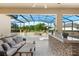 Inviting outdoor area with a covered lanai, comfortable seating, and a view of the pool at 10160 Mallard Landings Way, Orlando, FL 32832