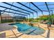 Beautiful screened-in pool area featuring a pool, hot tub, and patio furniture for relaxation at 10160 Mallard Landings Way, Orlando, FL 32832