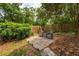 Enjoy the peaceful backyard featuring a cozy brick patio, perfect for outdoor relaxation and entertaining at 1017 Love Ln # 34, Apopka, FL 32703