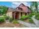 This home features a covered porch and inviting landscaping, creating an attractive curb appeal at 1017 Love Ln # 34, Apopka, FL 32703