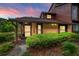 Charming condo showcasing a well-manicured lawn and beautiful earth-tone finishes at 1017 Love Ln # 34, Apopka, FL 32703