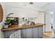 The kitchen bar opens to dining area at 1017 Love Ln # 34, Apopka, FL 32703