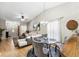 Open-concept design seamlessly connecting dining and living area, creating an airy atmosphere at 1017 Love Ln # 34, Apopka, FL 32703
