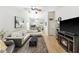 Spacious living room featuring high ceilings, a cozy fireplace, and an open floor plan at 1017 Love Ln # 34, Apopka, FL 32703