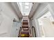 This bonus room is accessed via a wooden staircase that leads up to a unique living space at 1017 Love Ln # 34, Apopka, FL 32703