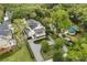 Aerial view of lovely two-story home and manicured front yard at 104 Cortland Ave, Winter Park, FL 32789