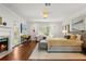 Bright and spacious bedroom with fireplace, desk, and ample natural light at 104 Cortland Ave, Winter Park, FL 32789