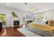 Bright bedroom with fireplace, desk, and large windows at 104 Cortland Ave, Winter Park, FL 32789