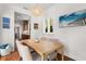 Cozy breakfast nook with hardwood floors and access to the kitchen at 104 Cortland Ave, Winter Park, FL 32789