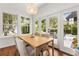 Light filled breakfast nook with access to the outdoor living space at 104 Cortland Ave, Winter Park, FL 32789