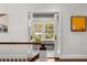 Entryway with glass doors showing bench and patterned tile floor at 104 Cortland Ave, Winter Park, FL 32789