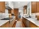 Beautiful kitchen with stainless appliances, gas range, wooden cabinets and hardwood floors at 104 Cortland Ave, Winter Park, FL 32789