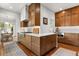 Modern kitchen features stainless appliances, gas range, stylish hood and butcher block accents at 104 Cortland Ave, Winter Park, FL 32789