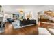 Open-concept living room featuring hardwood floors and abundant natural light at 104 Cortland Ave, Winter Park, FL 32789