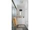 Bathroom with a vanity, cabinet, decorative rug, and glass shower door at 1040 Big Oaks, Oviedo, FL 32765