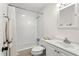 A clean bathroom with a shower-tub combination and a white vanity, offering a functional and neat space at 1190 Pecan St, Kissimmee, FL 34744
