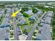 Charming townhome community features a central pond, playground, basketball court, and mature landscaping at 12661 Somerset Oaks St, Orlando, FL 32828