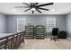 Bright bedroom with wood floors, contemporary ceiling fan, and spacious layout at 12661 Somerset Oaks St, Orlando, FL 32828