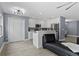 Bright kitchen features white cabinetry, stainless steel appliances, and a large pantry at 12661 Somerset Oaks St, Orlando, FL 32828