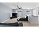Open floor plan that shows the living room flowing into the modern kitchen at 12661 Somerset Oaks St, Orlando, FL 32828