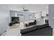 Bright living room features hardwood floors, sliding glass door, and modern ceiling fan at 12661 Somerset Oaks St, Orlando, FL 32828