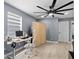Modern office with a ceiling fan and a window with a view at 12661 Somerset Oaks St, Orlando, FL 32828