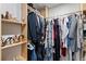 Organized walk-in closet with rods and shoe shelves at 12661 Somerset Oaks St, Orlando, FL 32828