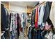 Organized walk-in closet with rods, shelving, and storage at 12661 Somerset Oaks St, Orlando, FL 32828