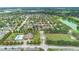 Neighborhood aerial view showcasing community amenities, a beautiful lake, and well-maintained landscaping at 1286 Tallow Rd, Apopka, FL 32703