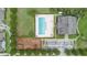Birds eye view of community clubhouse, pool and playground in a lush, well maintained planned community at 1286 Tallow Rd, Apopka, FL 32703