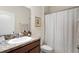 Standard bathroom featuring a shower-tub combination, a single sink vanity, and neutral finishes at 1286 Tallow Rd, Apopka, FL 32703