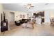 Spacious open-plan living room featuring modern furnishings and tile flooring at 1286 Tallow Rd, Apopka, FL 32703