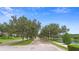 Scenic street view featuring tree-lined avenues and manicured lawns in a peaceful neighborhood at 1286 Tallow Rd, Apopka, FL 32703