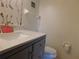 Bathroom featuring a modern vanity with a clean white countertop and contemporary fixtures at 130 Krider Rd, Sanford, FL 32773