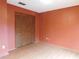 Bedroom with hardwood floors and double door closet, creating an organized and inviting space at 130 Krider Rd, Sanford, FL 32773