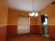 Interior dining room view with chandelier and window at 130 Krider Rd, Sanford, FL 32773