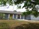 Exterior view of a single-story house featuring well-maintained front lawn at 130 Krider Rd, Sanford, FL 32773