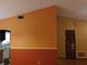 Bright living room with an open layout and unique two-tone wall design at 130 Krider Rd, Sanford, FL 32773