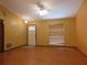 The living room features wood floor and ceiling fan at 130 Krider Rd, Sanford, FL 32773