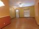 An interior living room featuring wood floors, a ceiling fan, and natural light at 130 Krider Rd, Sanford, FL 32773