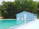 Community pool with lane markers and lounge chairs provides a great space for residents to cool off and relax at 130 Krider Rd, Sanford, FL 32773