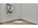 Bright bedroom with natural light, hardwood floors, and a large window at 1371 Lake Dr, Casselberry, FL 32707