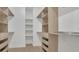 Spacious walk-in closet with built-in shelving and storage solutions at 1371 Lake Dr, Casselberry, FL 32707